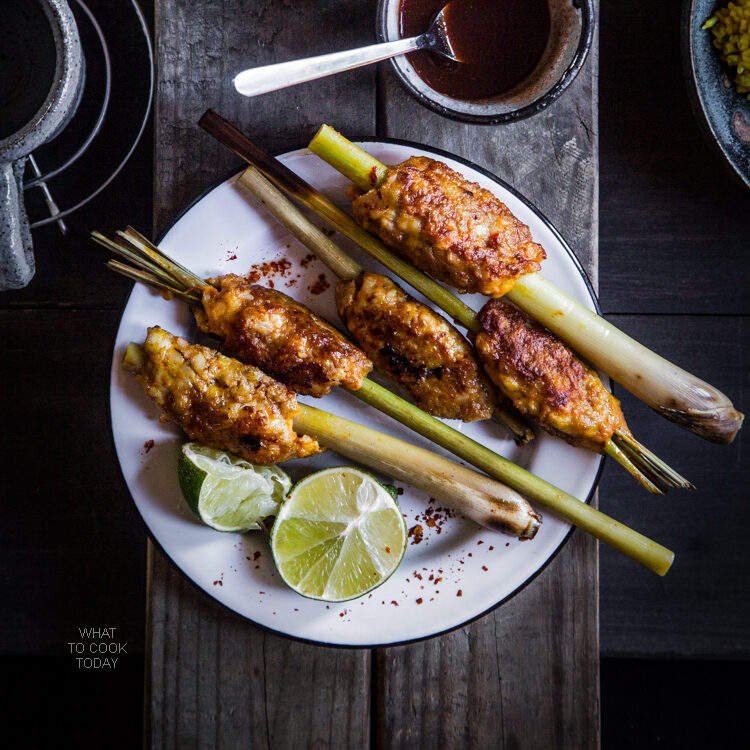 Minced seafood or chicken mixed with herbs and wrapped around lemongrass sticks