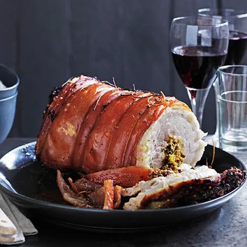 A ceremonial roast pork infused with turmeric, coriander and traditional spice paste.